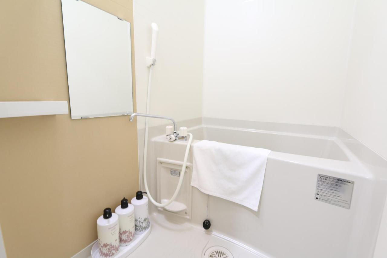 Apartamento Elizabeth Garden Shinsaibashi Osaka Exterior foto